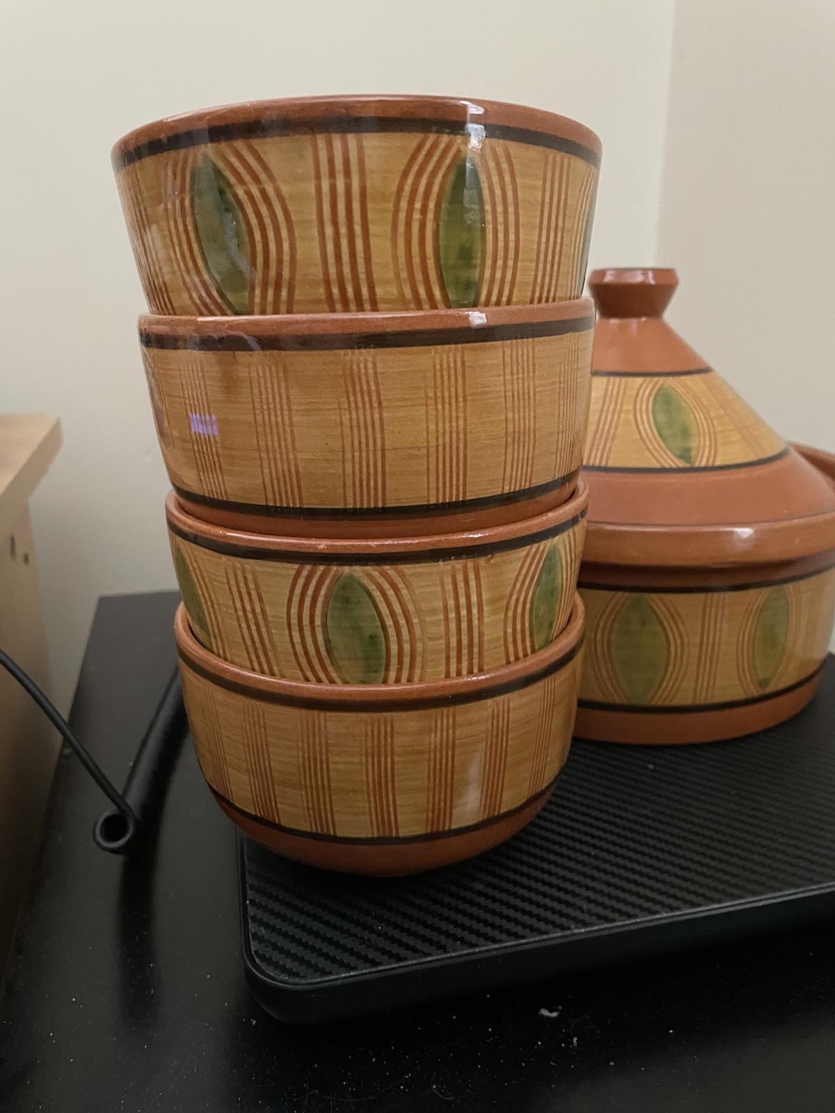Moroccan cooking tagine 7 3/4″ across 3 1/2″high plus 4 bowls. Attar. see note