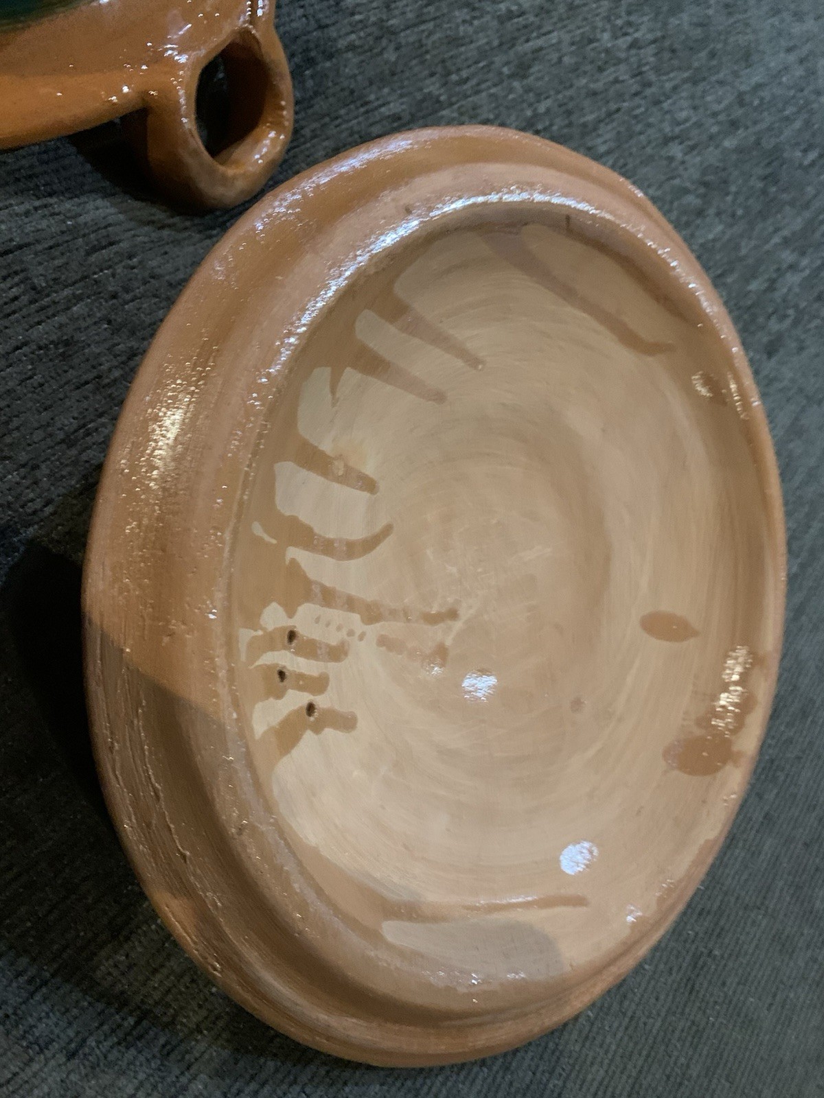 Traditional Mexican clay cazuela casserole dish feat hand-painted designs.