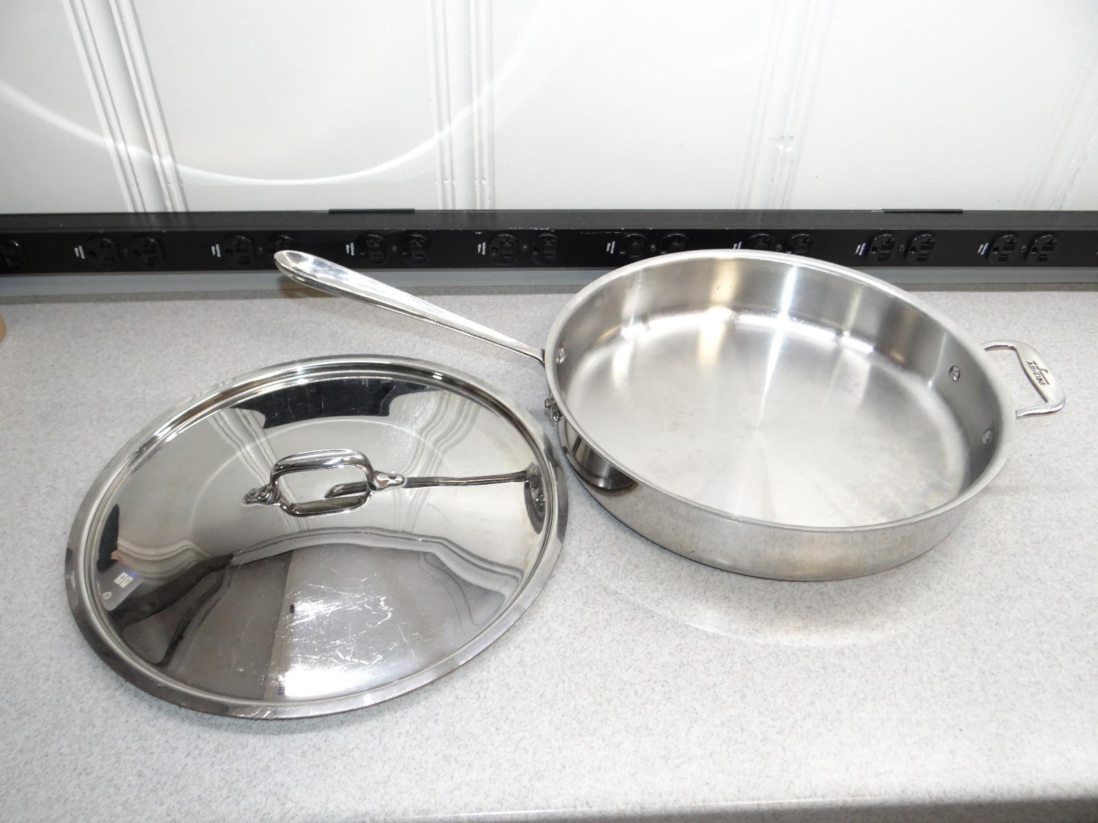 All-Clad 5 qt D3 Saute Pan with Lid Double Handle 13″