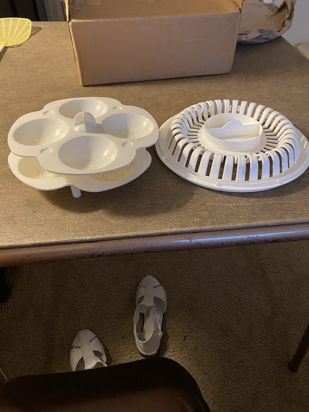 2 Steaming Trays And A Holder In Stove Top Pot