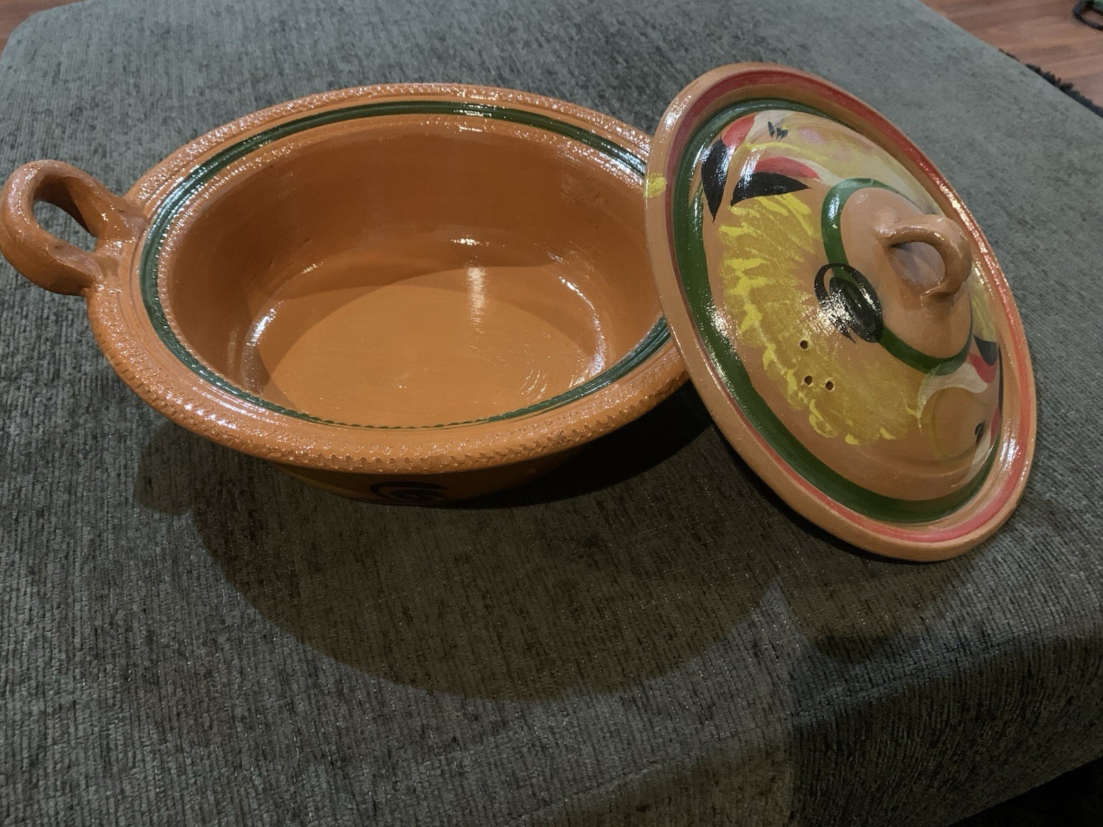 Traditional Mexican clay cazuela casserole dish feat hand-painted designs.