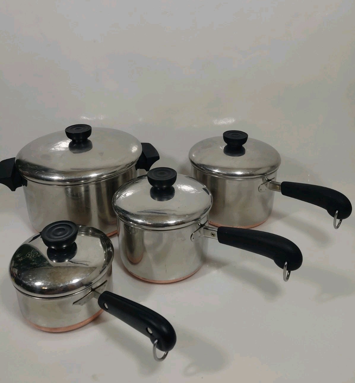 Revere Ware 1801-8 Piece-4 Qt Stock Pot, 2 Qt, 1.5 Qt, 3/4 Qt Sauce Pans W/ Lids