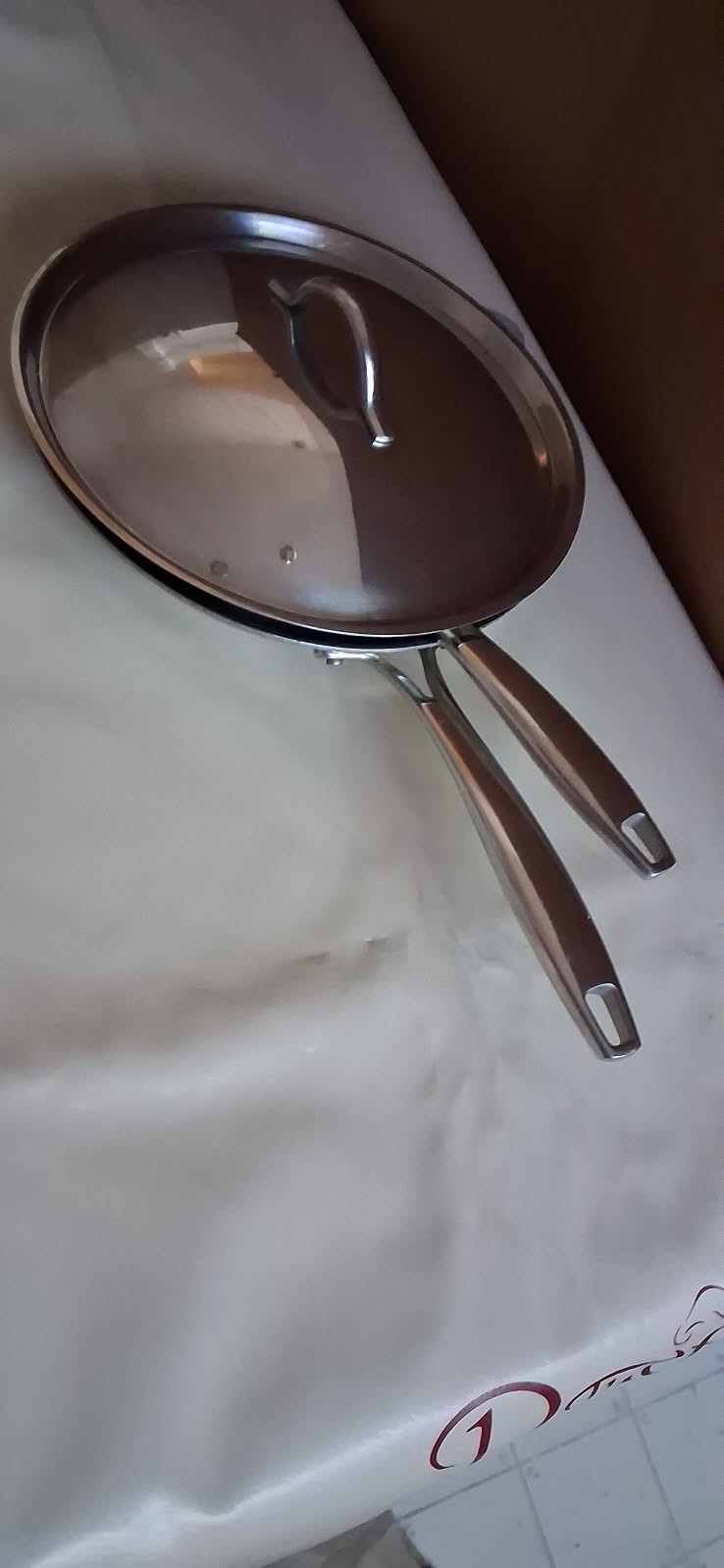 Lot 2 Kirkland Signature Professional 10″ 8” Stainless Sauté Skillets W/10″ Lid.