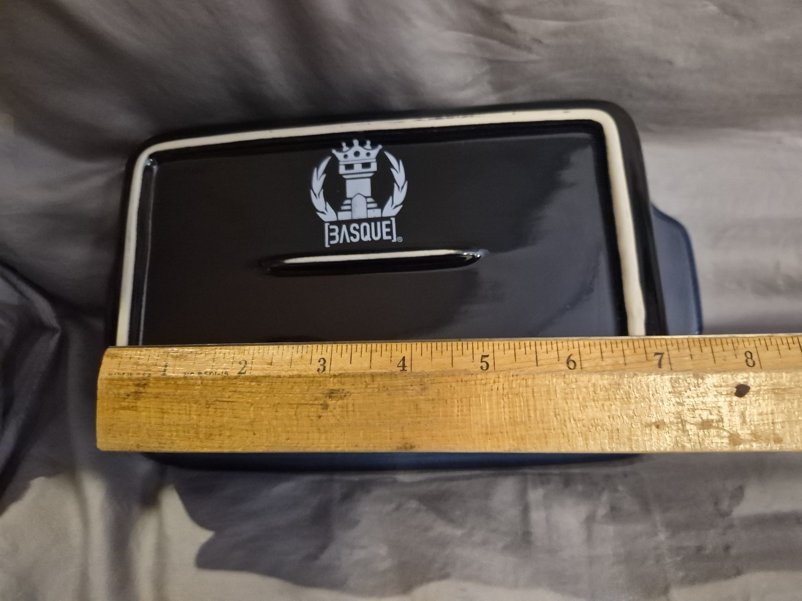 A great condition stoneware rectangular baking dish in a dark blue color 8 1/2
