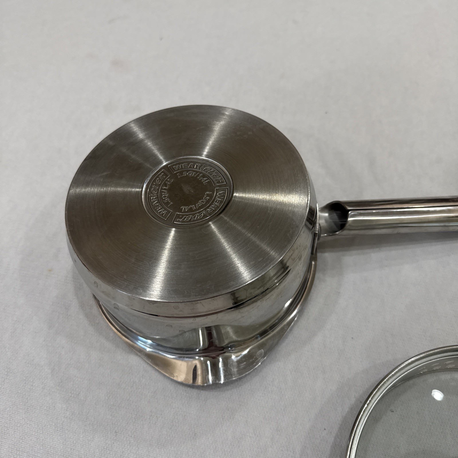 WEAREVER Stainless Steel 1.5 Qt Double Spout/Strainer in Lid Sauce Pan