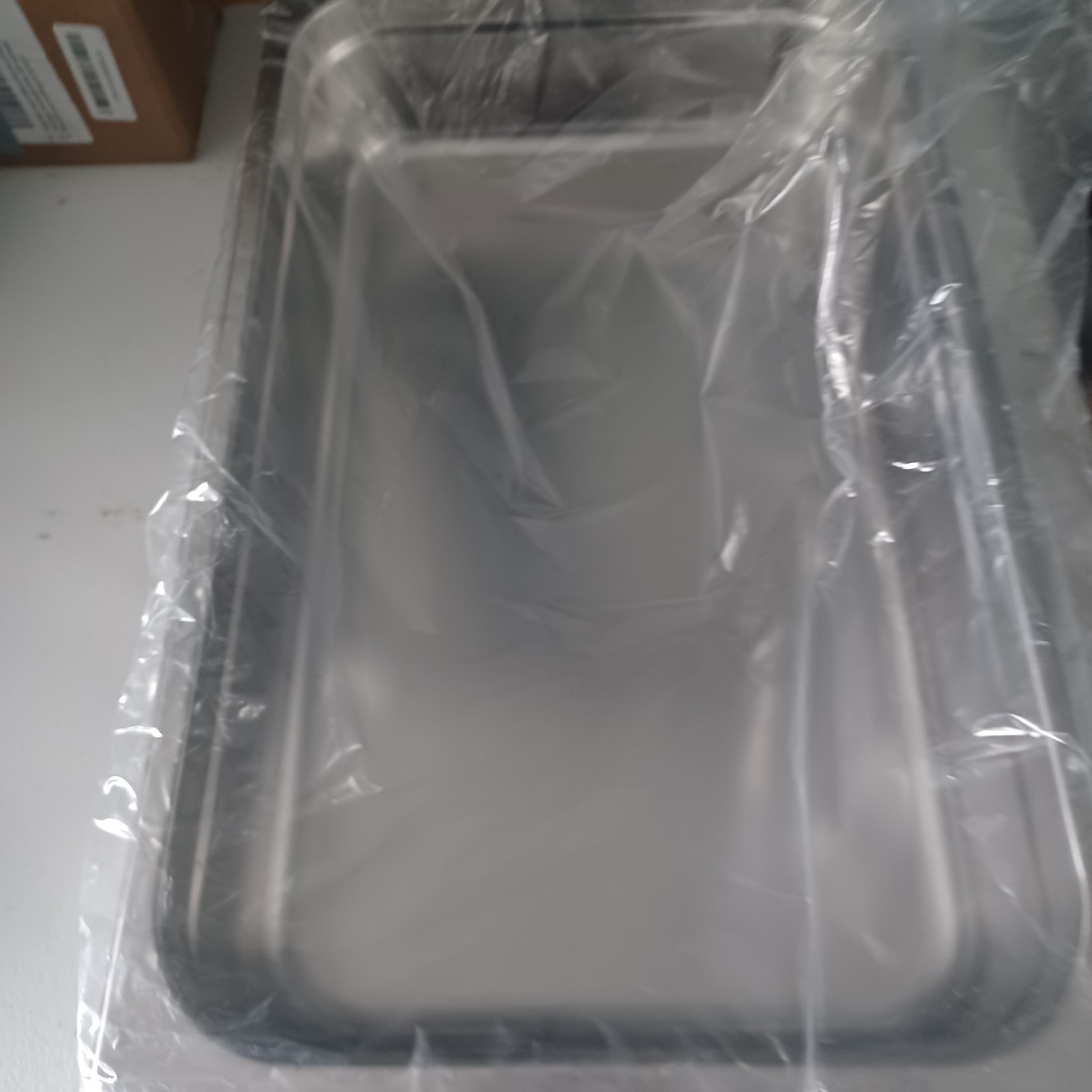 New Stainless Steel 21″ by 13″ by 3.5″ Roasting Pan. Great price on this item.