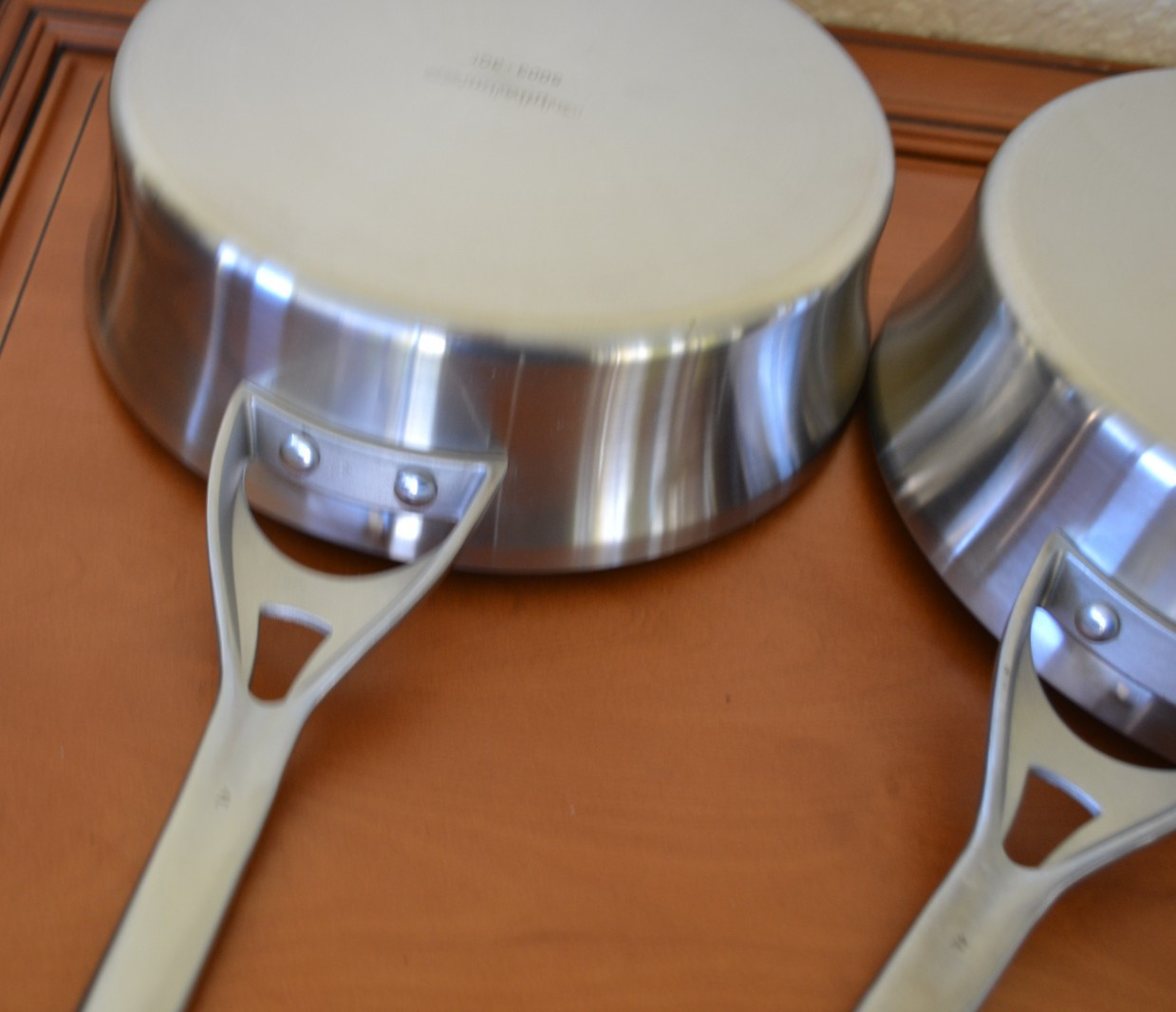 Calphalon Contemporary Stainless Steel 2 Sautepan pans with Lids and 10” Frypan