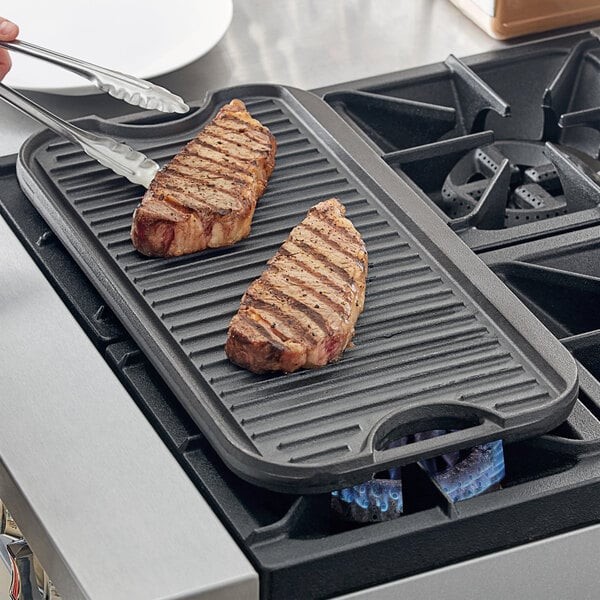 Valor 24 1/2″ x 14 1/2″ Pre-Seasoned Reversible Cast Iron Griddle and Grill Pan