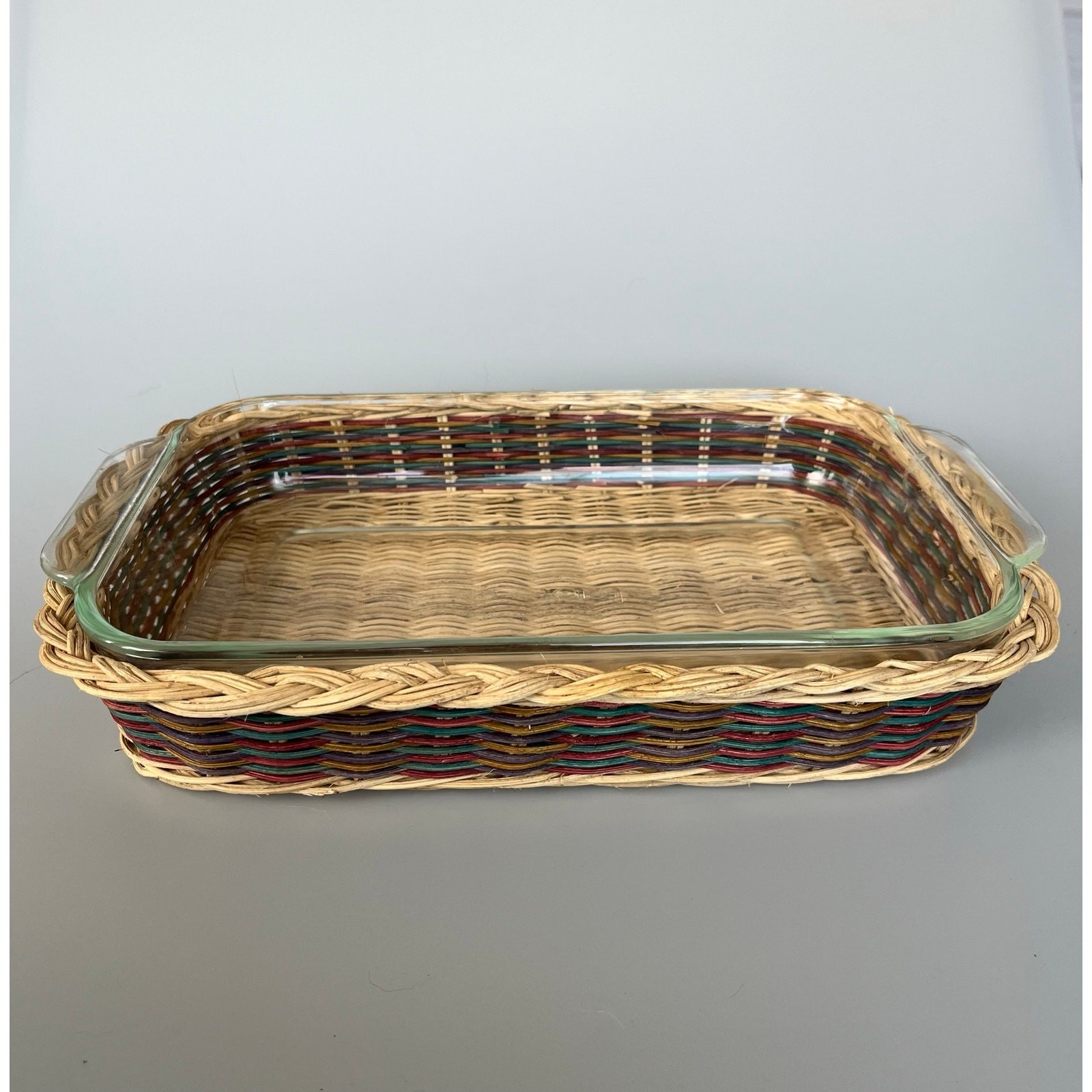 Vintage Pyrex Designs 2L 11x7x1.5″ Baking Pan in Rainbow Pattern Rattan Basket