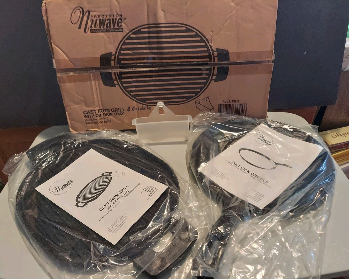 NuWave 2 pcs. Cast Iron Griddle 10.5″ Rd. & Cast Iron Grill #31104A 16.5″L