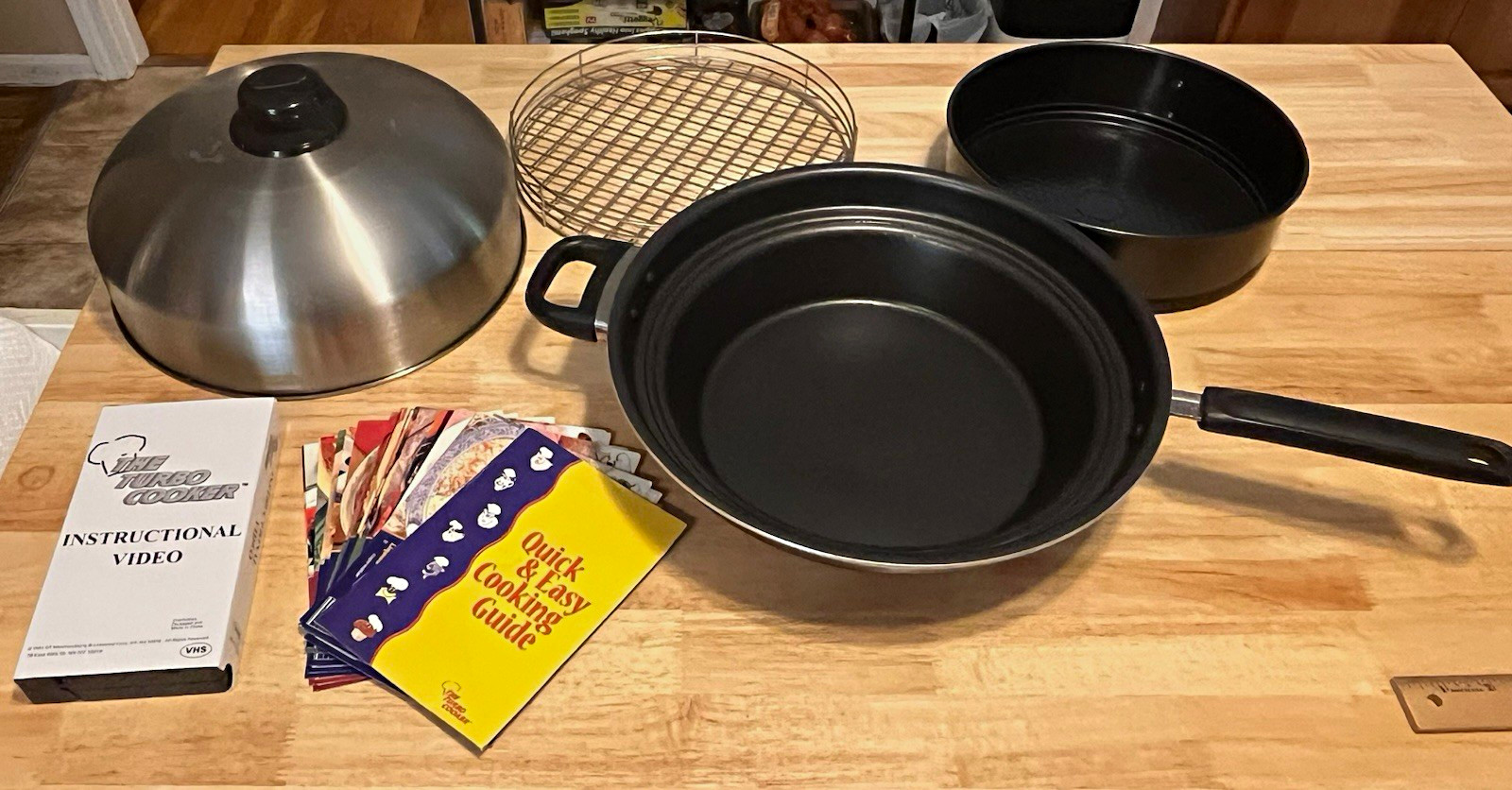 The Turbo Cooker Non-Stick 4-Piece Cookware Set w/ Lid & Rack Black/Silver