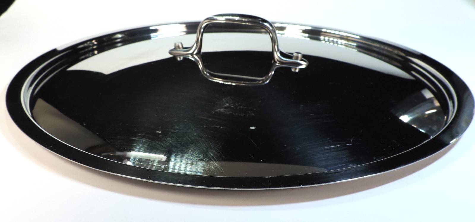 ALL-CLAD POLISHED STAINLESS STEEL PAN LID (13.75 OD, 12.75″ID) squared edge