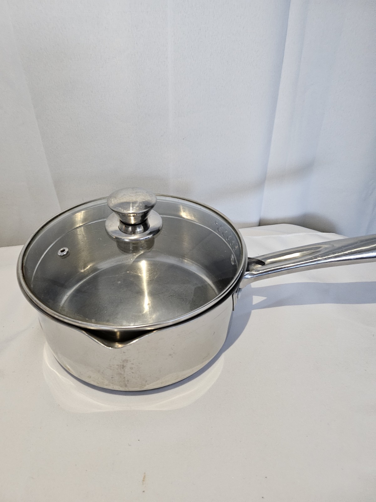 Wear Ever 1.5 Quart Dual Pour Spout Stainless Steel Sauce Pan With Strainer Lid