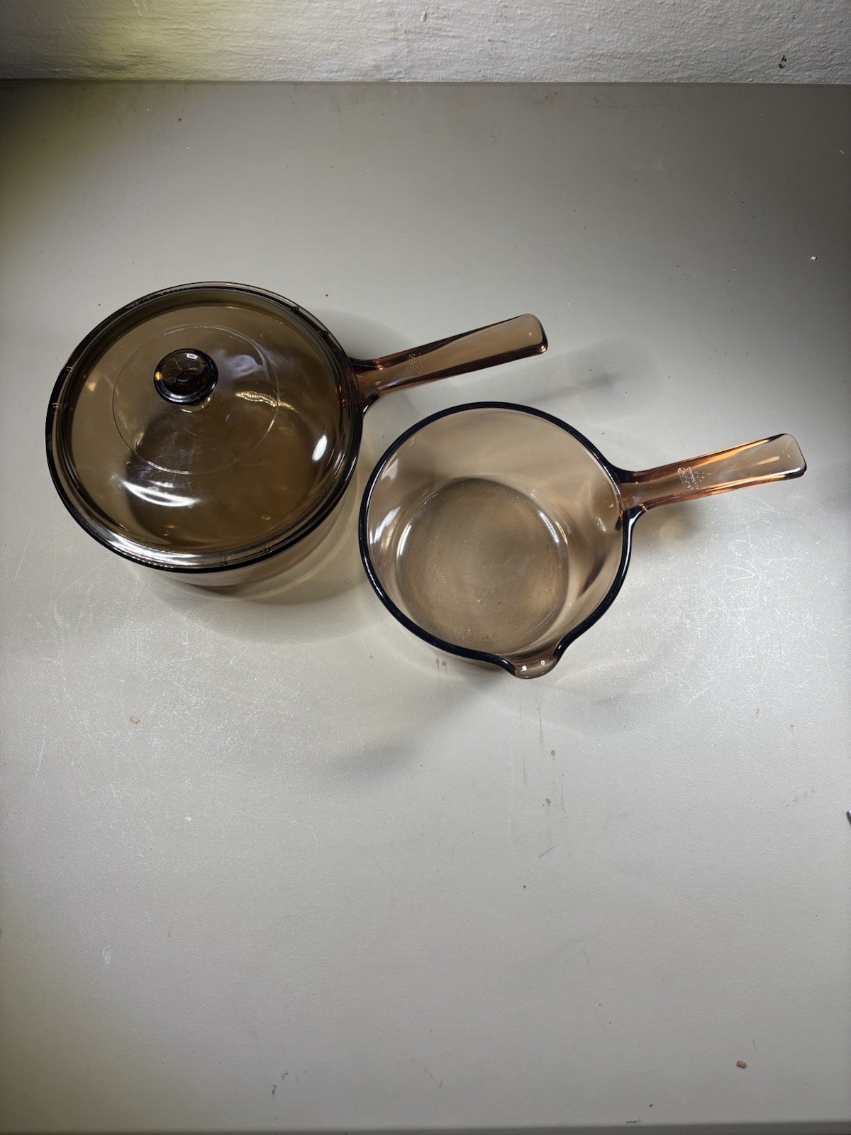 Visions Cookware Amber 3 Piece 1.5L With Lid And 1L Pour spout Saucepans