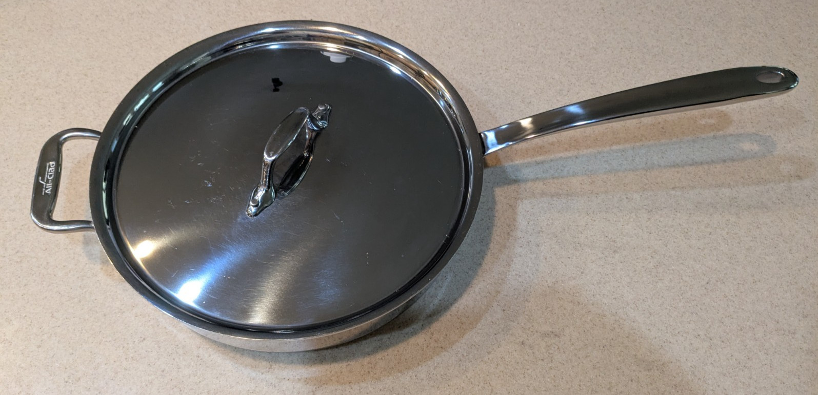 All-Clad D3® Tri-Ply Bonded Stainless-Steel 3-Qt Sauté Pan Double Handle w/ Lid